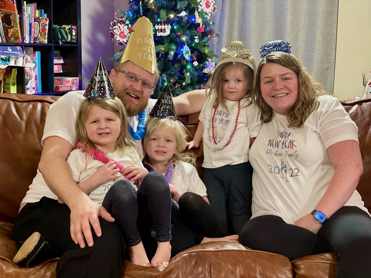 Adam and Linds family planning their travels in 2021