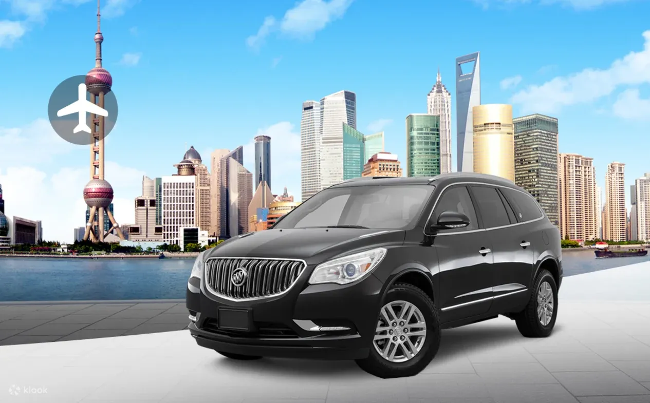Black SUV vehicle positioned in front of Shanghai skyline featuring Oriental Pearl Tower and modern skyscrapers across the Huangpu River